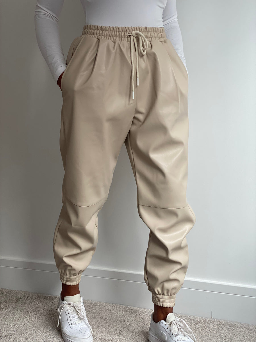 Leather joggers cream online